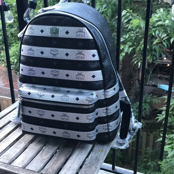 MCM | Bags | Mcm Spot Viseto Backpack Price Firm | Poshmark display picture 1